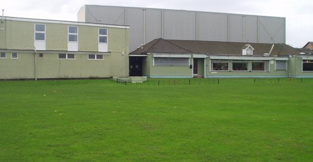 The squash club is the building on the left...click on the image to enter the web site.